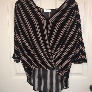 Crossed high-low blouse